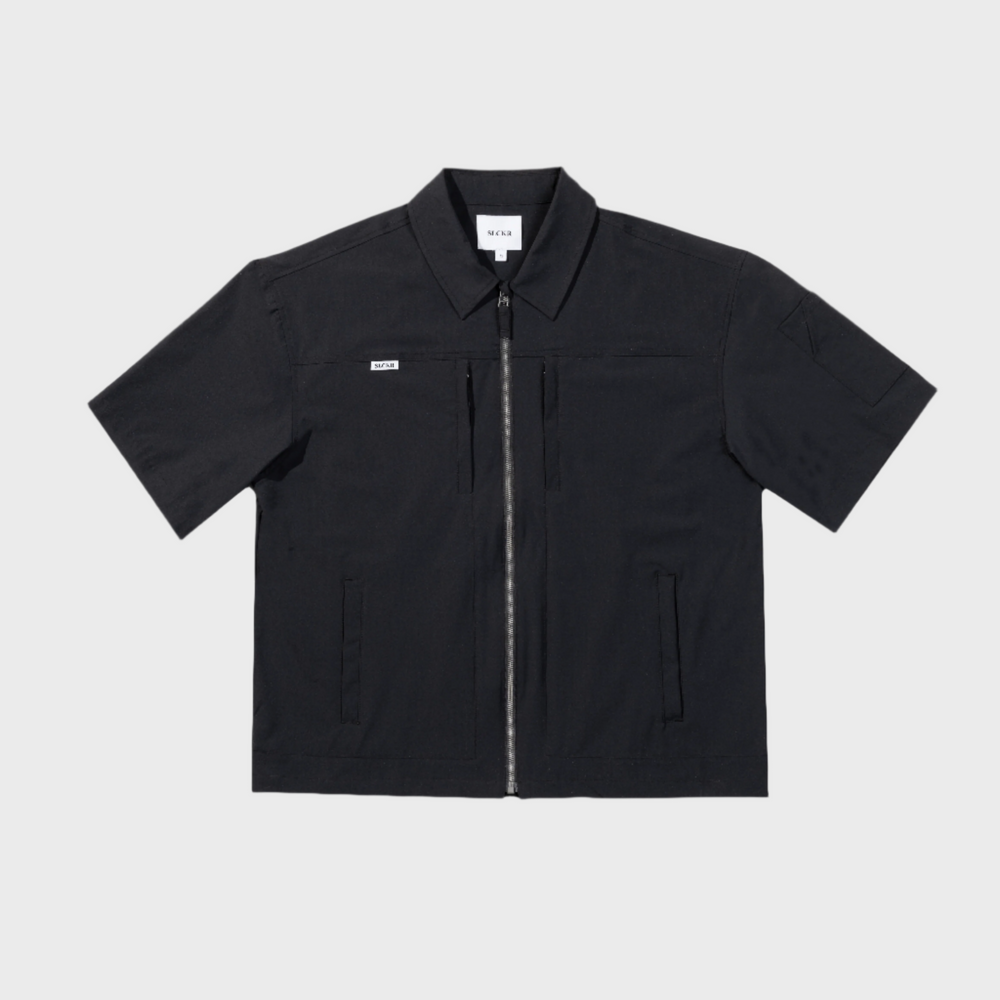 Black short-sleeve jacket on a light gray background